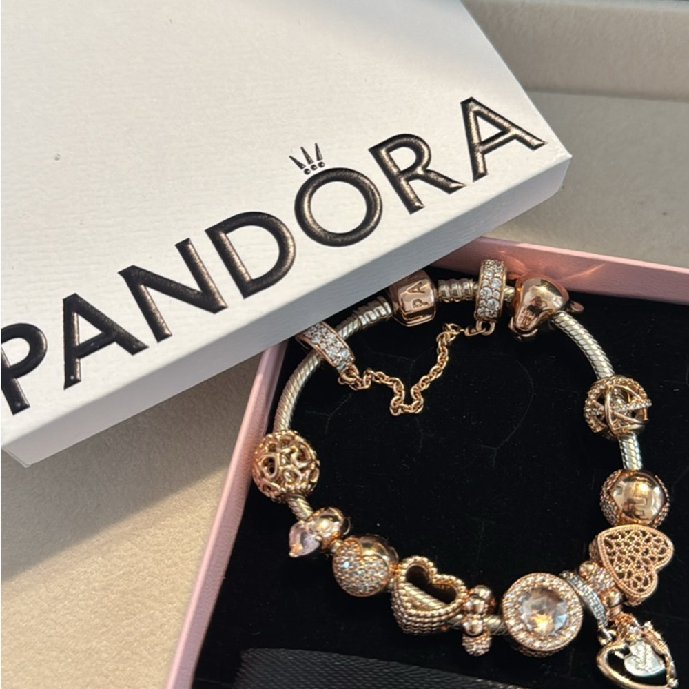 Pandora Gold Charm Bracelet with Intricate Designs